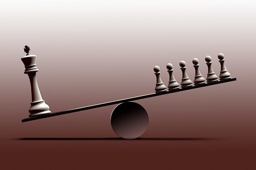 3D rendering of a conceptual representation of social inequality and the imbalance between social classes represented with chess pieces