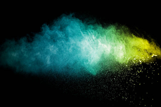 istock abstract green dust explosion on  black background.abstract green powder splattered on black background.Freeze motion of green powder exploding. 942696570