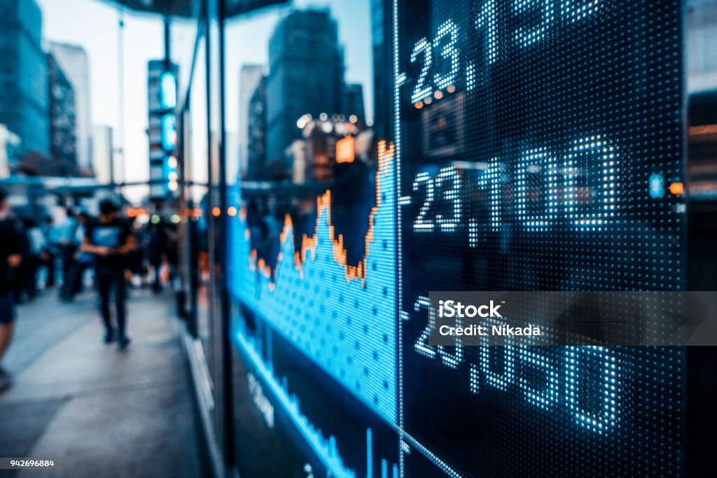 Financial stock market numbers and city light reflection Display stock market numbers Stock Market and Exchange Stock Photo