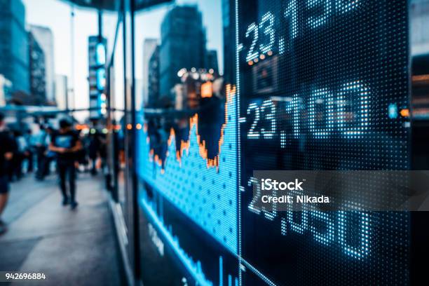 Financial Stock Market Numbers And City Light Reflection Stock Photo - Download Image Now