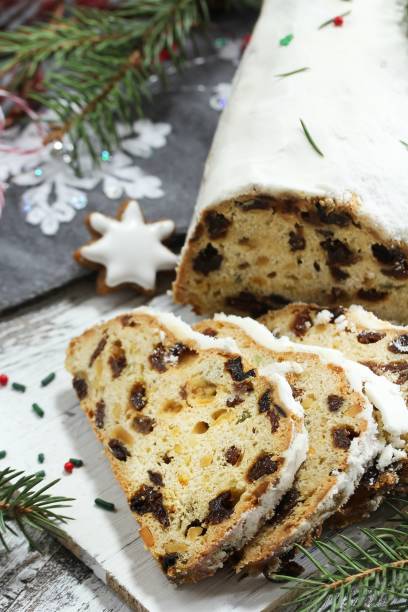 istock Christmas Stollen  on festive Xmas holiday background with copy space 942696908