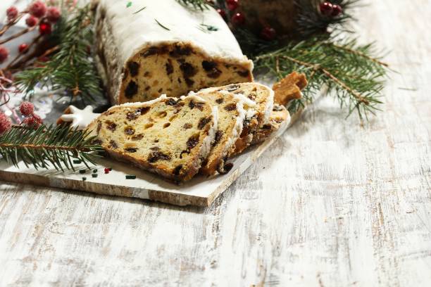 istock Christmas Stollen  on festive Xmas holiday background with copy space 942696926