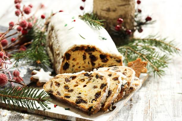 istock Christmas Stollen  on festive Xmas holiday background with copy space 942697144