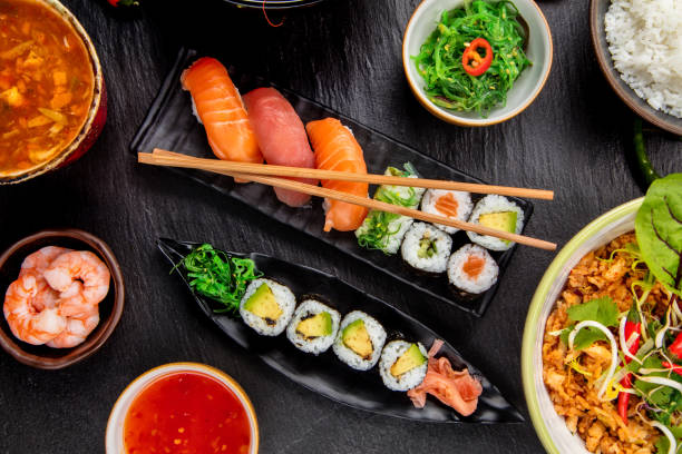istock Asian Sushi variation with many kinds of meals. 942699514