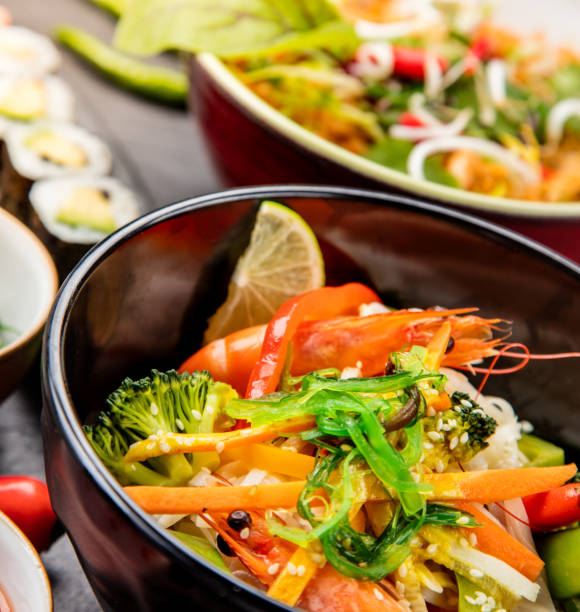 istock Asian variation of meals served in ceramic bowls 942699710