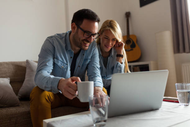 istock Happy couple relaxed at home 942700234