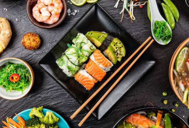 istock Asian Sushi variation with many kinds of meals. 942700314
