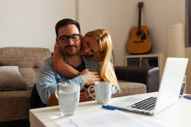 istock Happy couple relaxed at home 942700596