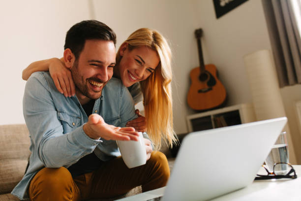 istock Happy couple relaxed at home 942700940