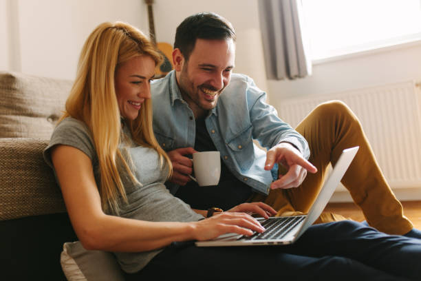 istock Happy couple relaxed at home 942703258