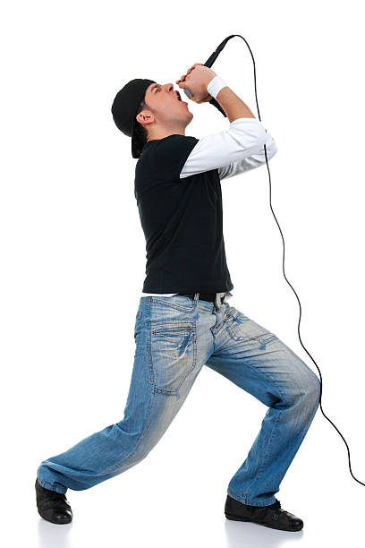 istock Hip hop singer singing loud into wired microphone 94270353