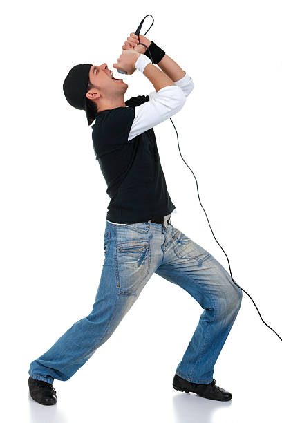 istock Male singer singing loud into microphone isolated on white backgrund 94270384