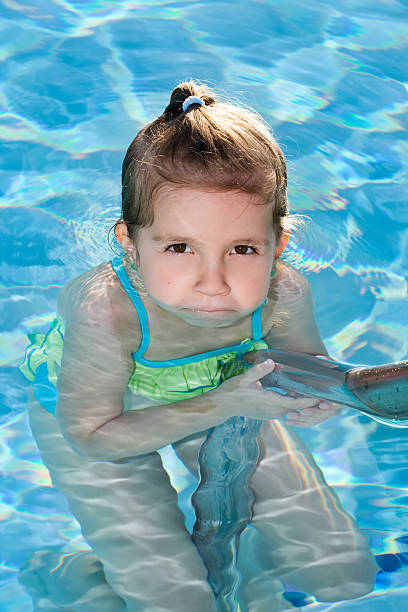 istock Cute girl in the pool 94270612