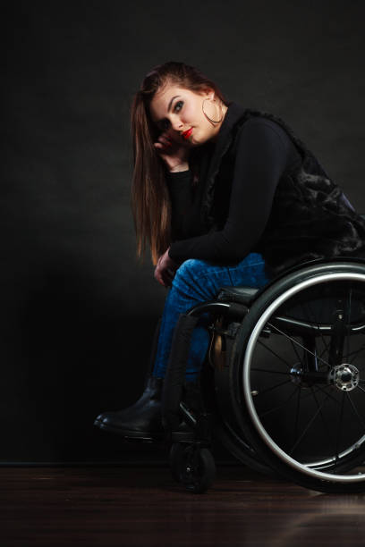 istock Sad girl on wheelchair. 942715464