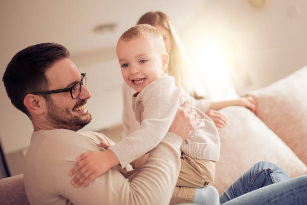 istock Happy family playing at home 942718032