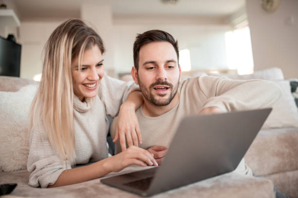 istock Beautiful young couple at home 942718150