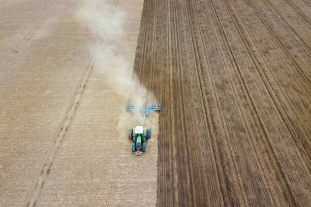 istock Field cultivation, preparation to plant, aerial view 942720544