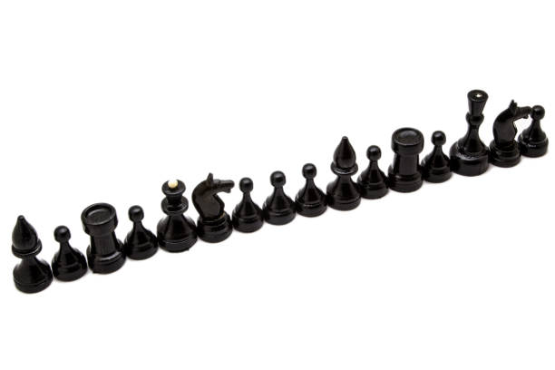 istock Black chess pieces isolated on white background 942724432