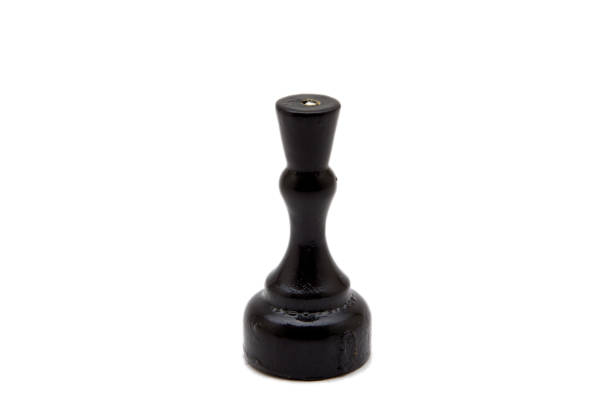 istock Black chess pieces isolated on white background 942724550