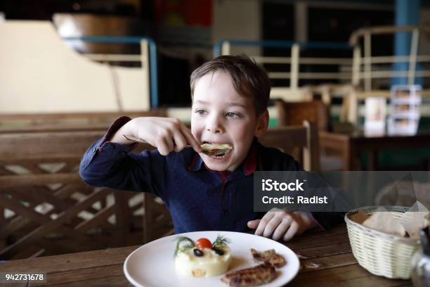 Child Has Mashed Potatoes Stock Photo - Download Image Now - Boys, Breakfast, Cafe