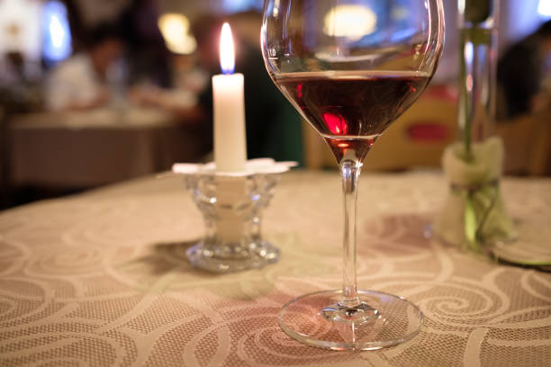 istock Glass with red wine in a wine bar 942732260