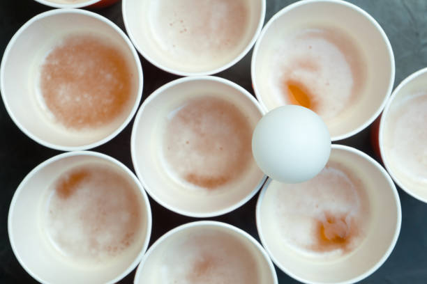 istock Beer pong. Popular game at parties. Place for your text. 942736636