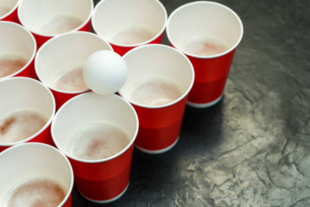 istock Beer pong. Popular game at parties. Place for your text. 942736744