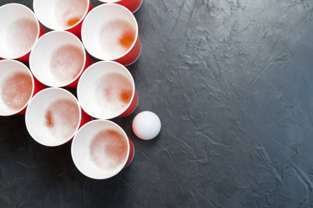 istock Beer pong. Popular game at parties. Place for your text. 942736800