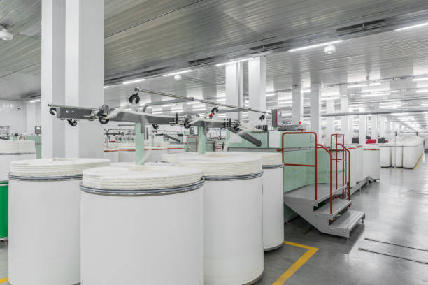 istock production of threads in a textile factory 942736920