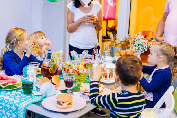 istock Cute Kids Having Fun Outside for Summer Backyard Party 942737326