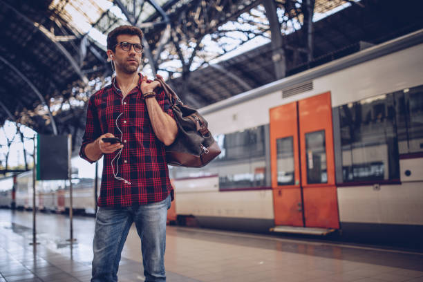 istock Man waiting at station 942740160