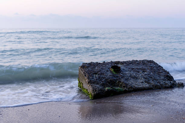 istock Ruins on beach, early morning light. 942740332