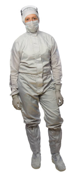 istock a woman in full growth, wearing a white protective suit and mask, on white 942740566