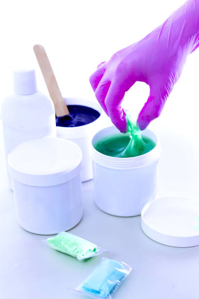 istock Jars with cosmetics and pasta for shugaring 942743376