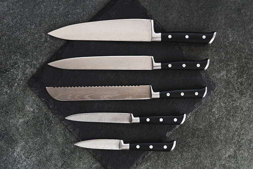 A good set of kitchen knives for slicing. Kitchen utensils for cooks