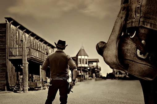 western sheriff in old wild west ghost town