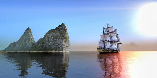 Pirate ship near rock formation stock photo