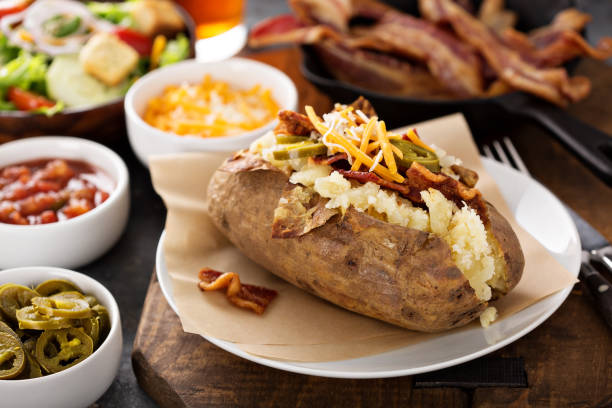 istock Loaded baked potato with bacon and cheese 942756224
