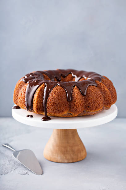 istock Vanilla bundt cake with chocolate glaze 942764674