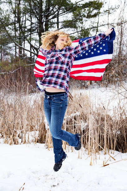 istock Proudly holding the flag in her arms. 942765240