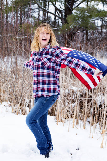 istock Proudly holding the flag in her arms. 942768388