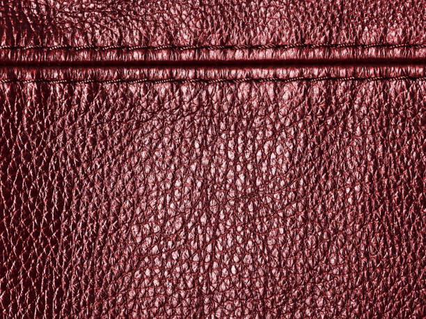 istock Natural red leather texture background with seam 942773826