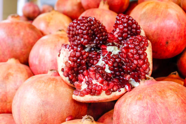 istock Pomegranate, background on the agricultural market 942773862