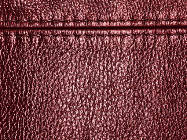istock Natural red leather texture background with seam 942773870