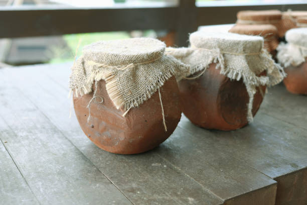istock Mountain honey in clay pots on the table 942774030