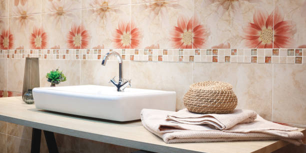 istock Bathroom interior with sink and faucet 942777208