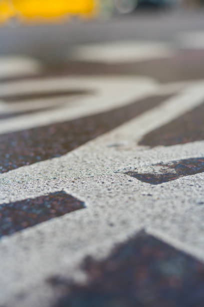 istock Rain wet bike lane symbol 942784592