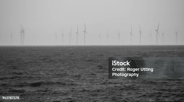 Rampion Wind Faarm Off The Coast Of Brighton Looms Out Of The Grey Skies Stock Photo - Download Image Now