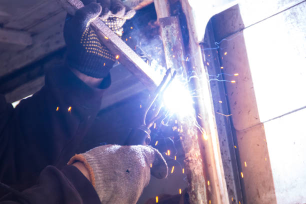 istock Worker welding the steel part by manual 942792702