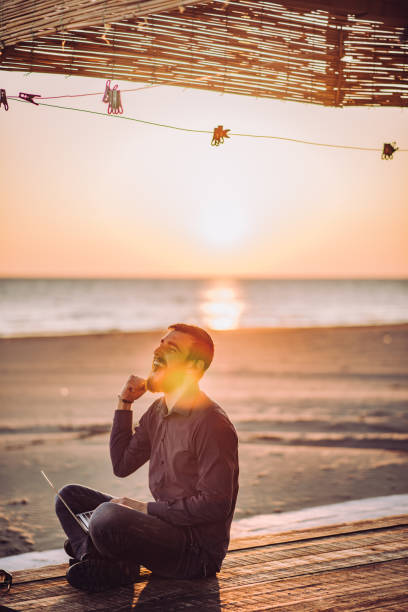 istock Father and son have fun on beach 942792828